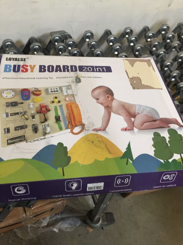 Photo 2 of Montessori Busy Board for Toddlers-Busy Board Toys Learn to Dress Toys for 1 2 3 4 Year Old Kids - Learning Toy for Airplane or Car Travel-20-in-1 Yellow