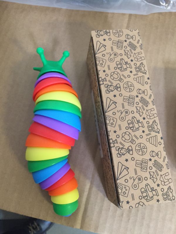 Photo 2 of Cevioce Fidget Slug Toy, Sensory Slug Fidget Toy for Kids & Adults, 1Pc Cute Autism Sensory Toys for Autistic Children?Great Birthday Gift for Girls Boys - Exercise Wrist Strength & Stress Relief Rainbow