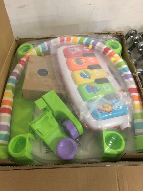 Photo 1 of Fisher-Price Deluxe Kick 'n Play Piano Gym, Green, Gender Neutral, 1 Count (Pack of 1) (Frustration Free Packaging) Kick 'n Play Piano - Frustration Free Packaging
