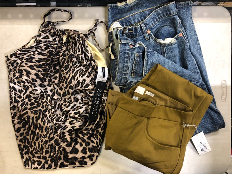 Photo 1 of 3-ITEM WOMENS CLOTHING BUNDLE: 1 swim "dreamsuit" top cheetah print size 14; brown pants size 14; universal thread goods jeans size 14/32R