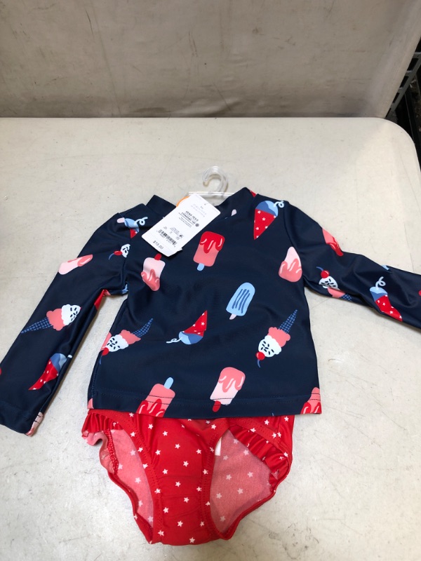 Photo 2 of Carter's Just One You® Baby Boys' 2pc Long Sleeve Floral Print Rash Guard Set Blue/Coral Orange
size 9 months 