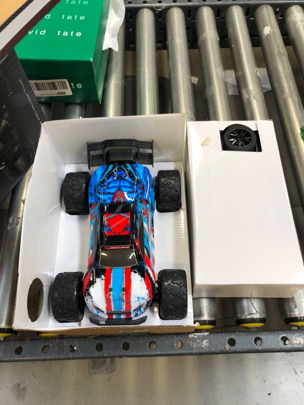 Photo 1 of PHOUPHO 1:18 Scale 40+km/h RC Cars for Adults high Speed Remote Control Truck All-Terrain 4WD Fast Racing Hobby Car with Rechargeable Batteries Toys for Boys Girls Gift