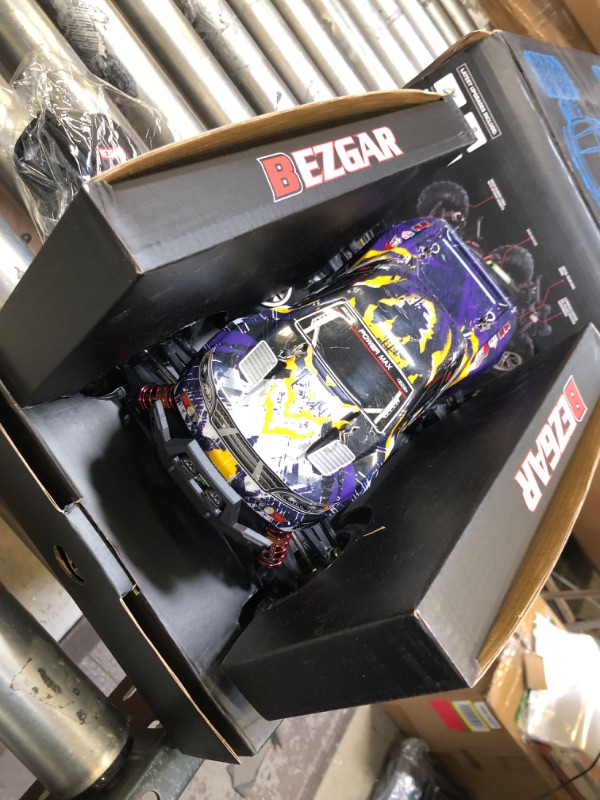 Photo 2 of BEZGAR HM164 Brushless Hobby Grade 1:16 Scale Remote Control Truck, 4WD High Speed 52+ kmh All Terrains Off Road RC Monster Vehicle Car Crawler with 3 Rechargeable Batteries for Boys Kids and Adults Yellow-purple