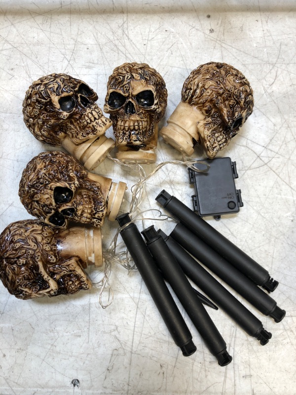 Photo 2 of 5PK Halloween Skull Pathway Lights, Waterproof & Battery Operated Skull Stake Lights for Halloween Decorations Outdoor Garden Yard Pathway Decor