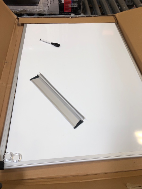 Photo 2 of Amazon Basics Magnetic Dry Erase White Board, 36 x 24-Inch Whiteboard - Silver Aluminum Frame 24" x 36" Magnetic, Aluminum Frame