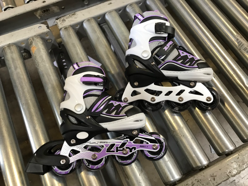 Photo 2 of 2PM SPORTS Cytia Pink Girls Adjustable Illuminating Inline Skates with Light up Wheels, Fun Flashing Beginner Roller Skates for Kids purple Small - Little Kids (10C-13C US)