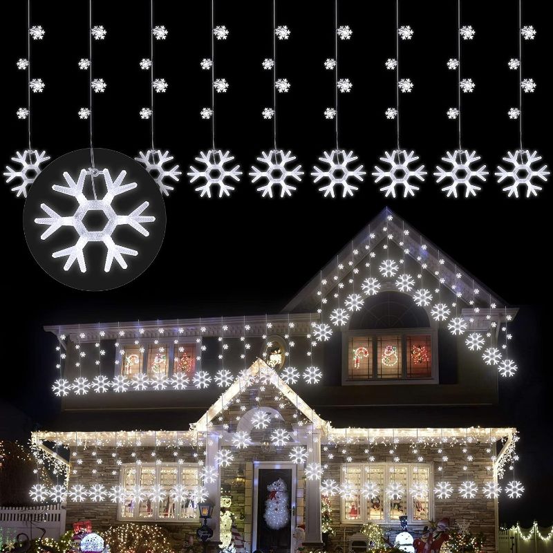 Photo 1 of  Snowflake Icicle Lights Outdoor, 100 LED 10 Drops Connectable 8 Twinkle Modes Waterproof Icicle Christmas Lights for Outdoor, Indoor, Eaves, Window, Christmas Decorations (White)