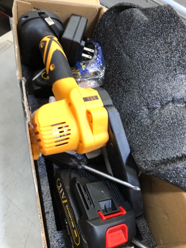 Photo 1 of Mini Chainsaw Cordless Small Chainsaw, Upgraded 6 Inch Battery Powered Chainsaw Electric Chainsaw With Security Lock for Trees Branches Trimming Wood Cutting (2Pcs Batteries and 2Pcs Chains) 6inch-yellowa