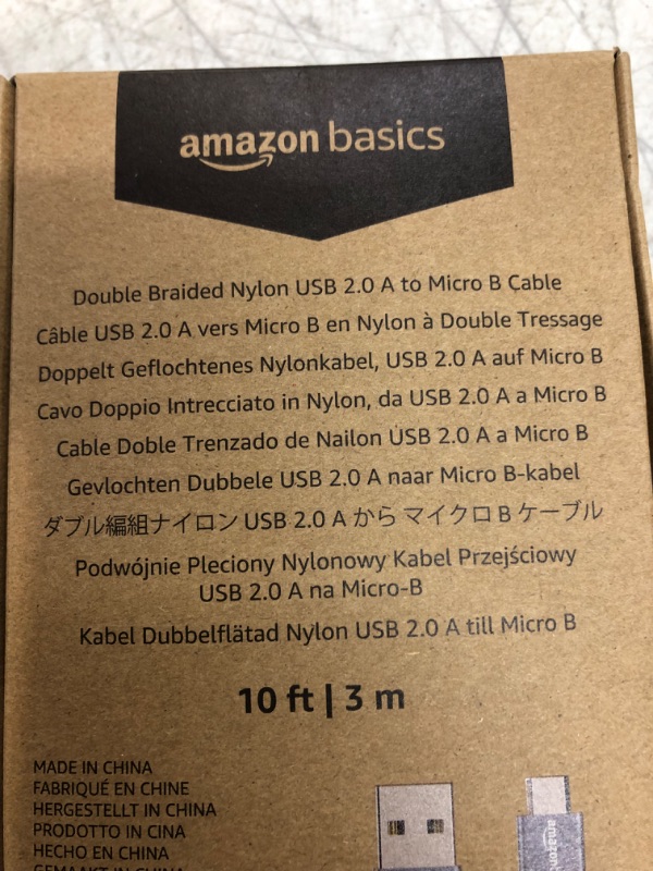 Photo 2 of Amazon Basics Micro USB to USB-A 2.0 Cable, Nylon Braided Cord, 480Mbps Transfer Speed, Gold-Plated, 10 Foot, Dark Gray Dark Grey 10 Feet