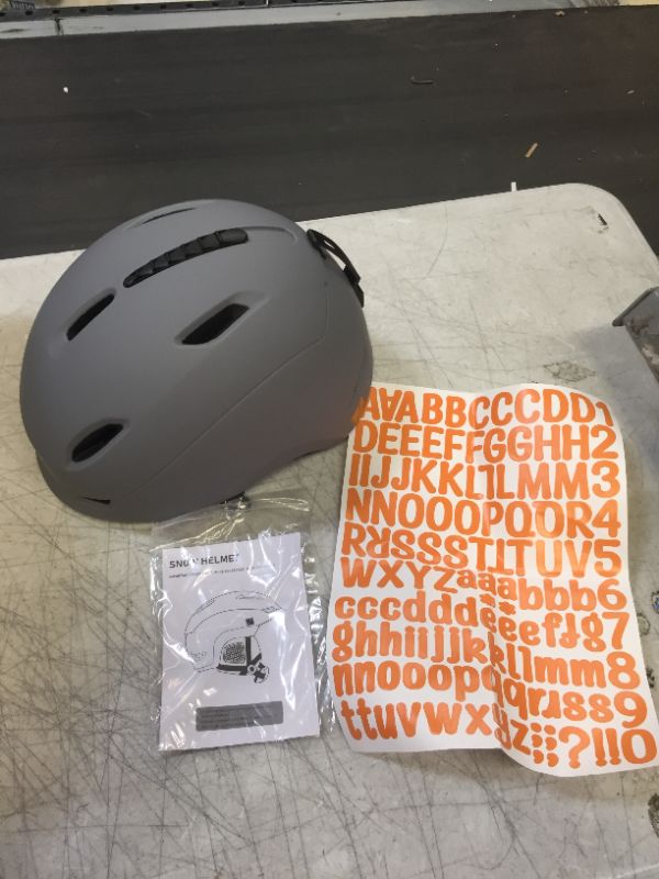 Photo 1 of ADULT SNOW HELMET 
SIZE M 