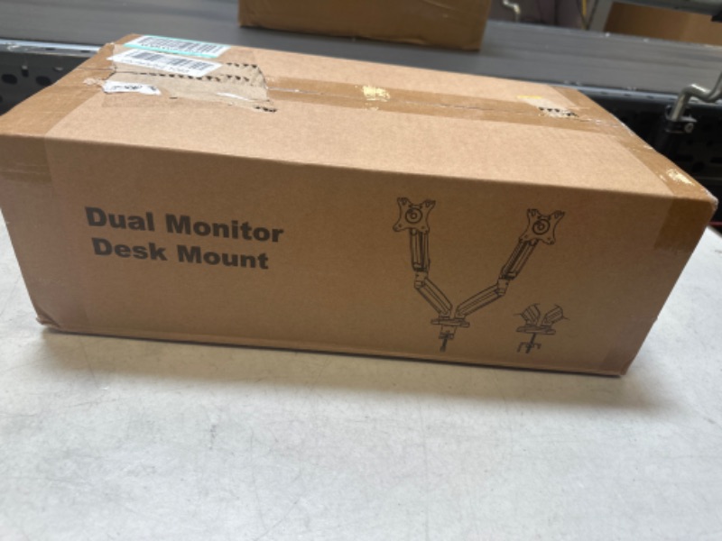 Photo 1 of Dual Monitor Desk Mount 