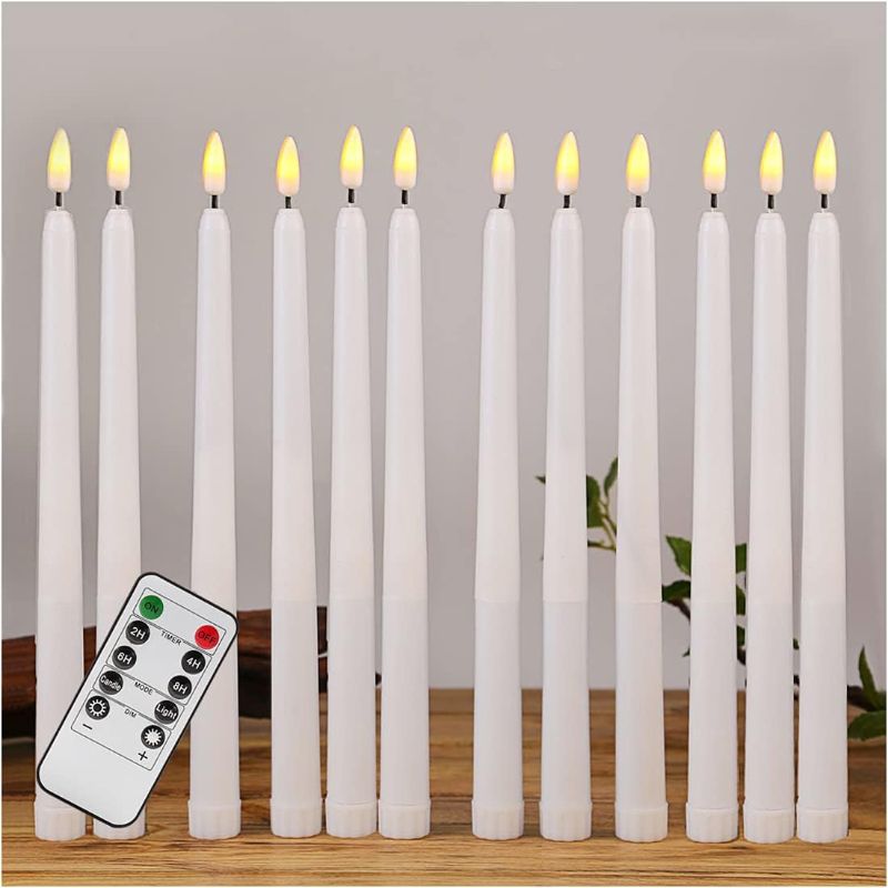 Photo 1 of duduta White Flameless Taper Candles with Remote Timer, Flickering Realistic LED Battery Operated Candlesticks Set of 12
