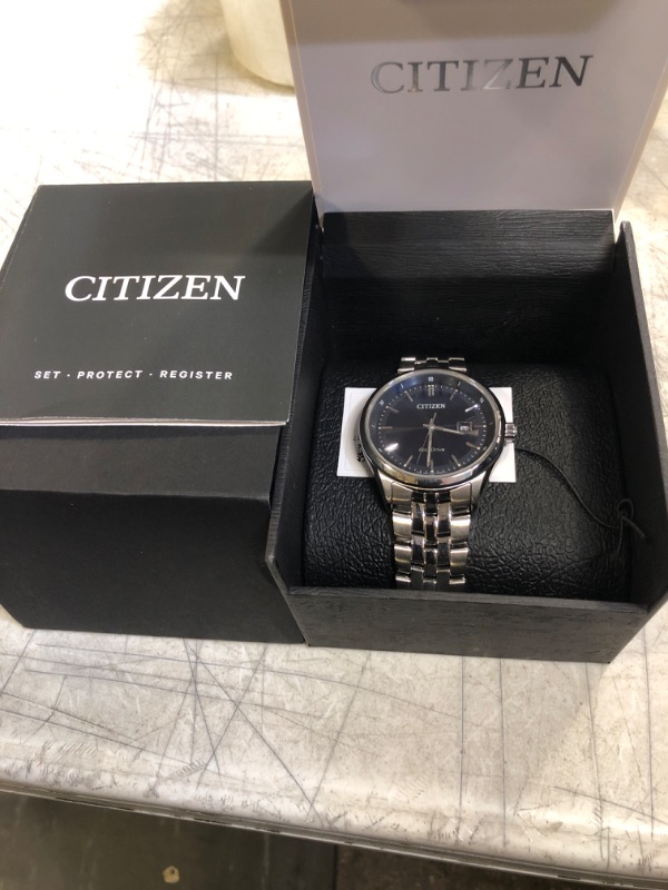 Photo 2 of Citizen Men's Eco-Drive Corso Classic Watch in Stainless Steel, Blue Dial (Model: BM7251-53L)