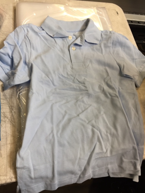 Photo 1 of BOYS SHORT SLEEVE POLO SHIRT BOYS SIZE 5-6