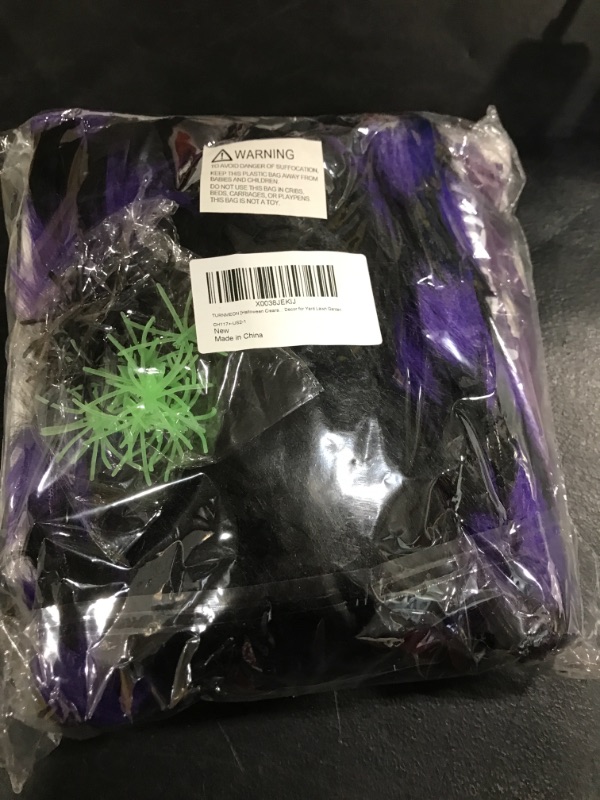 Photo 1 of 17 Ft Giant Spider Web Halloween Decorations Outdoor with 50" Large Purple Spider, Stretch Cobweb,10 Glow in The Dark Spiders 10 Fake Spiders Halloween Indoor Outside Creepy Decor Yard Lawn Garden