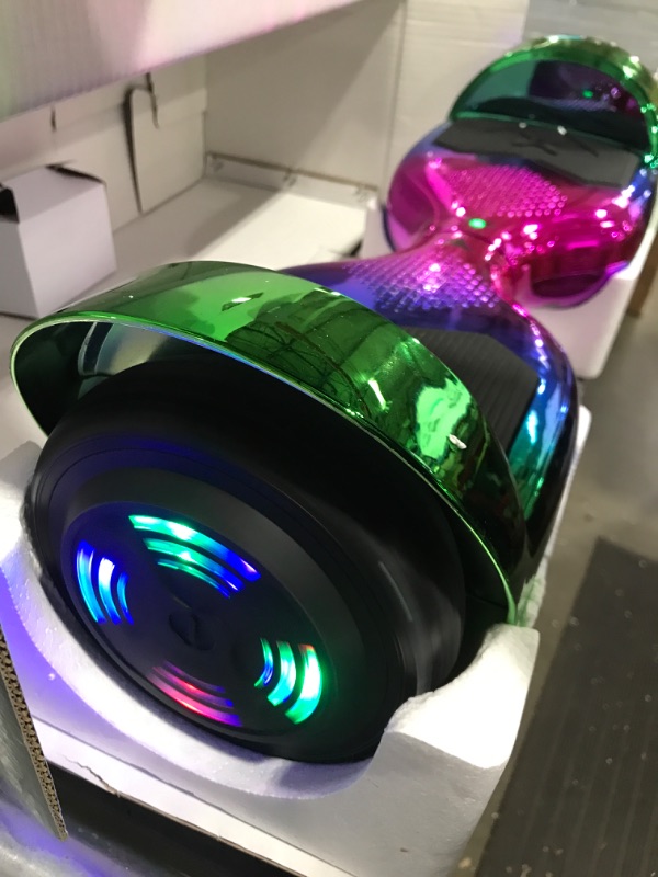 Photo 3 of Hover-1 Helix Electric Hoverboard | 7MPH Top Speed, 4 Mile Range, 6HR Full-Charge, Built-in Bluetooth Speaker, Rider Modes: Beginner to Expert Hoverboard Iridescent