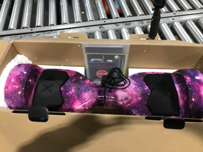 Photo 2 of Hover-1 Helix Electric Hoverboard | 7MPH Top Speed, 4 Mile Range, 6HR Full-Charge, Built-in Bluetooth Speaker, Rider Modes: Beginner to Expert Hoverboard Galaxy