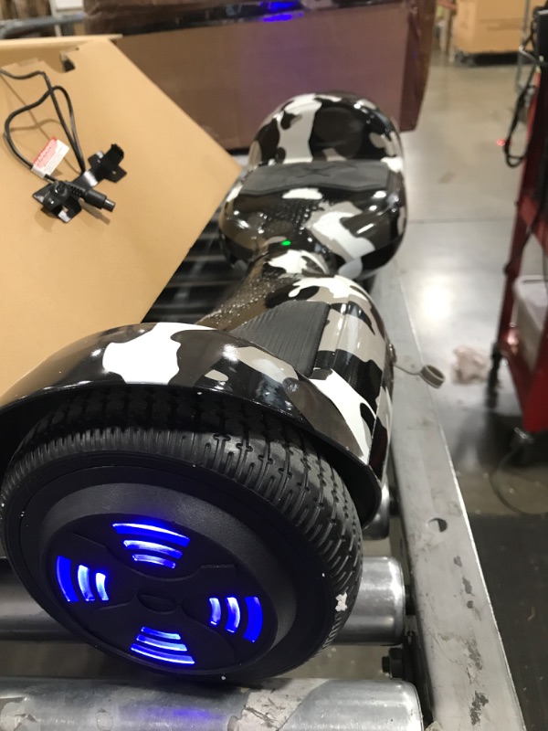 Photo 3 of Hover-1 Helix Electric Hoverboard | 7MPH Top Speed, 4 Mile Range, 6HR Full-Charge, Built-in Bluetooth Speaker, Rider Modes: Beginner to Expert Hoverboard Camo