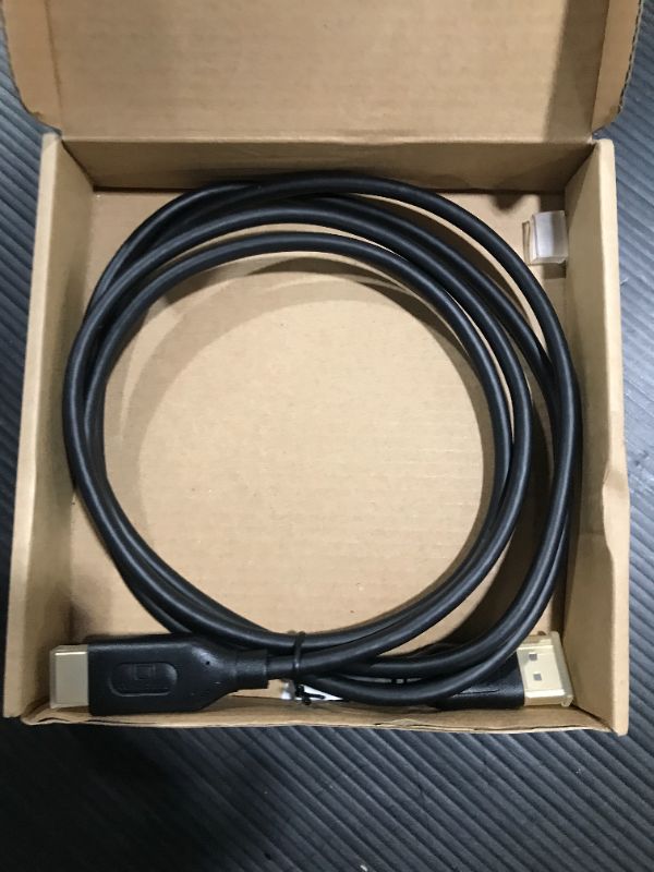 Photo 2 of AmazonBasics DisplayPort to HDMI Display Cable - 6 Feet