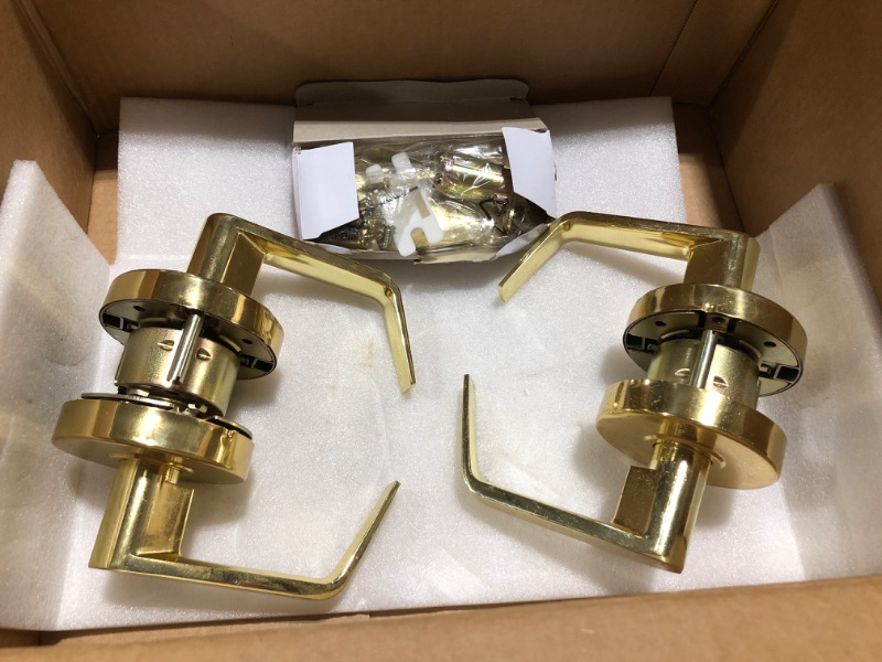 Photo 1 of 2 sets of gold door handles with hardware