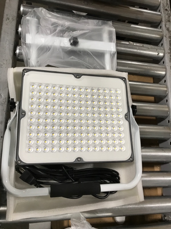 Photo 2 of 100W LED Work Light, 10000LM Portable Flood Light with Stand, IP66 Waterproof Job Site Worklight, 16ft/5m Cord with Plug Outdoor Working Lighting 6000K Daylight for Workshop, Garage, Construction Site 100w ( 12.6*10.24*3.54inch ) 1 Piece