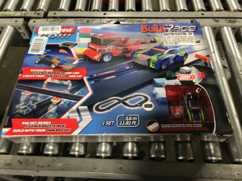 Photo 2 of Carrera GO!!! Build 'N Race 62529 Racing Set 3.6 Electric Powered Slot Car Racing Kids Toy Blocks Race Track Set Includes 2 Hand Controllers and 2 Cars in 1:43 Scale