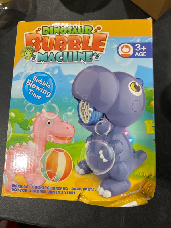 Photo 1 of Dinosaur Bubble Machine for Toddlers, Automatic Bubbles Blower Rechargeable with Led Lights and 4 Bubble Solutions, Bubble Maker Outdoor Outside Party Toys for Kids 4-8 Orange