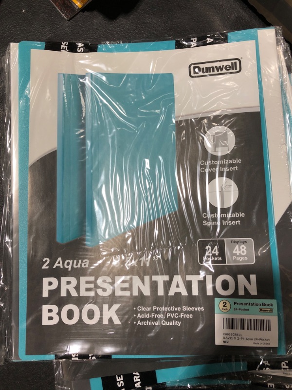 Photo 2 of Dunwell Binders with Plastic Sleeves 24-Pocket - (2 Pack, Aqua) Presentation Books 8.5x11, Portfolio Folders with 8.5 x 11 Sheet Protectors, Each Displays 48 Letter Size Pages, Kids Artwork