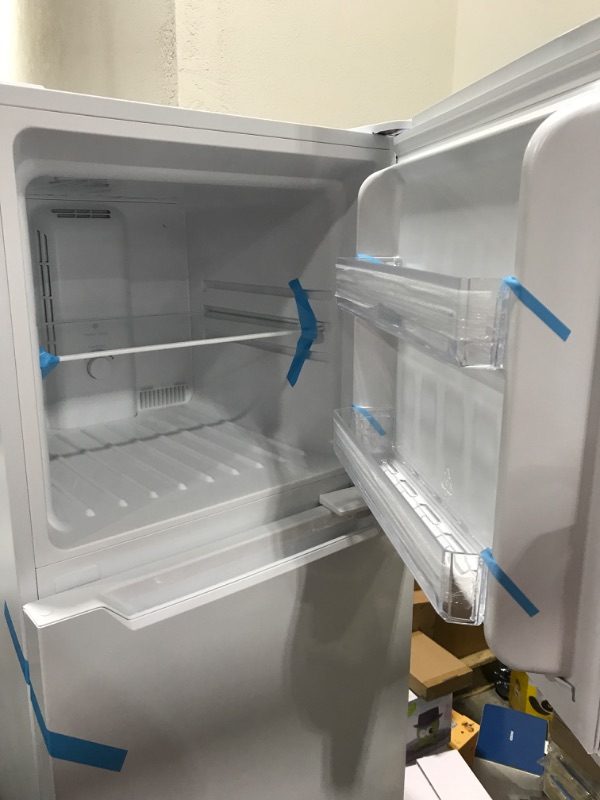 Photo 4 of Frigidaire 11.6 Cu. Ft. Compact ADA Top Freezer Refrigerator in White with Electronic Control Panel, Reversible Door Swing, ENERGY STAR