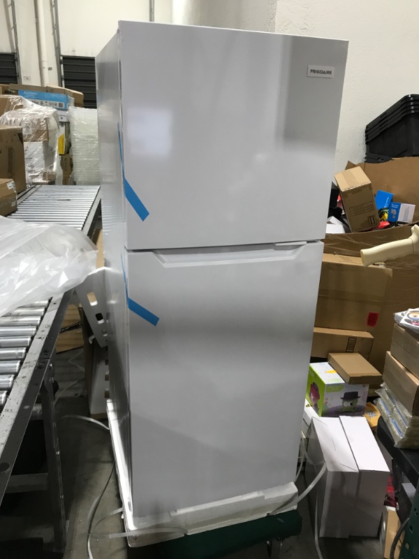 Photo 3 of Frigidaire 11.6 Cu. Ft. Compact ADA Top Freezer Refrigerator in White with Electronic Control Panel, Reversible Door Swing, ENERGY STAR