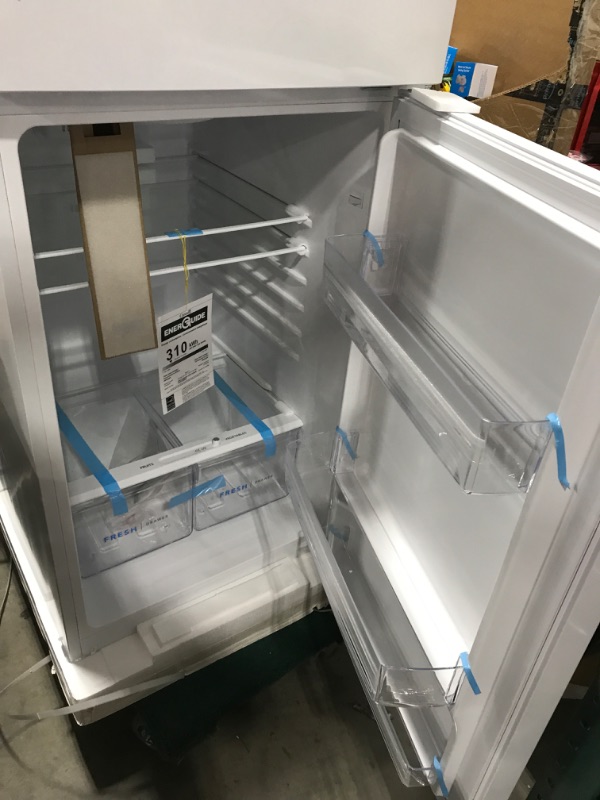 Photo 5 of Frigidaire 11.6 Cu. Ft. Compact ADA Top Freezer Refrigerator in White with Electronic Control Panel, Reversible Door Swing, ENERGY STAR