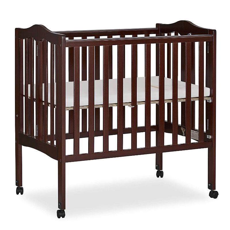 Photo 1 of Dream On Me 2-in-1 Lightweight Folding Portable Stationary Side Crib in Espresso, Greenguard Gold Certified, Baby Crib to Playpen, Folds Flat for Storage, Locking Wheels
