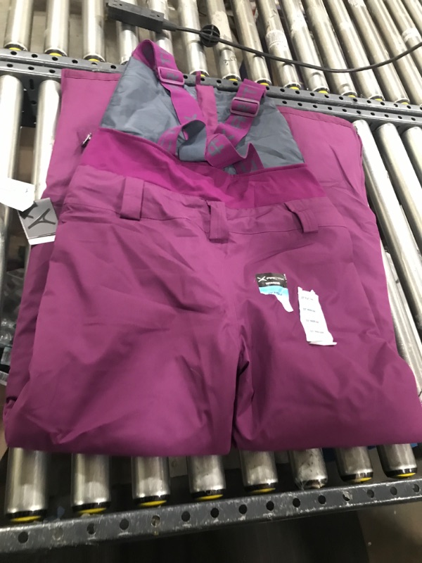 Photo 2 of Arctix Women's Eco Friendly Traverse Bib Overalls, Plum, Medium Tall
