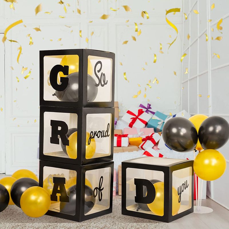 Photo 1 of 4pcs Graduation Balloon Box Black Grad Balloon Boxes with “GRAD” ”So proud of you” Letter to Decorate, 20pcs Black Gold Balloons for Graduation Party Decor Supplies https://a.co/d/0kvJbBO