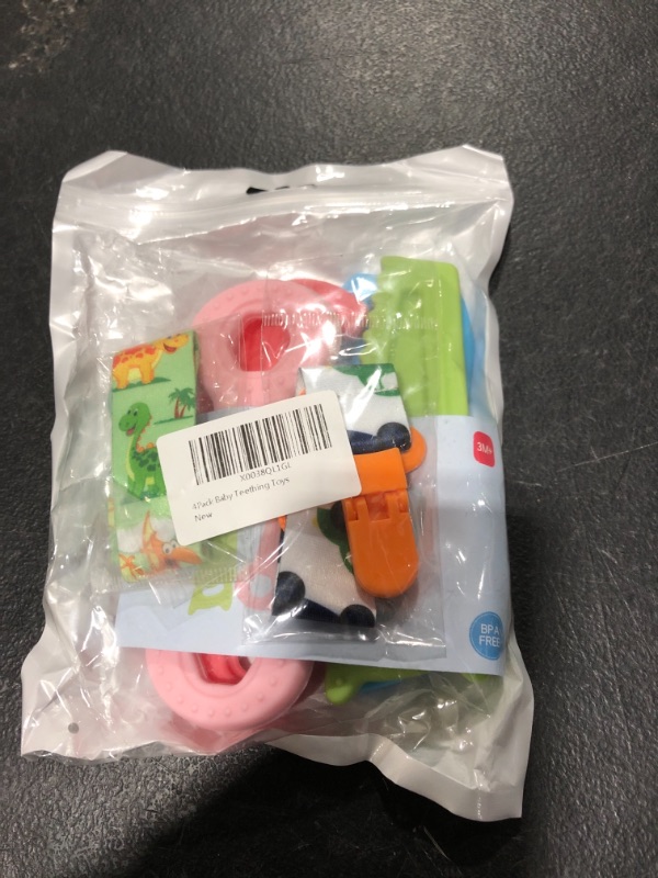 Photo 1 of 4Pack Teething Toys for Babies 0-6 Months with Lanyard, Baby Infant Teething Toys for Molars 6-12 Months, Freezer Safe Soft Silicone Baby Molar Teether Chew Toys Wrench Pliers Shape