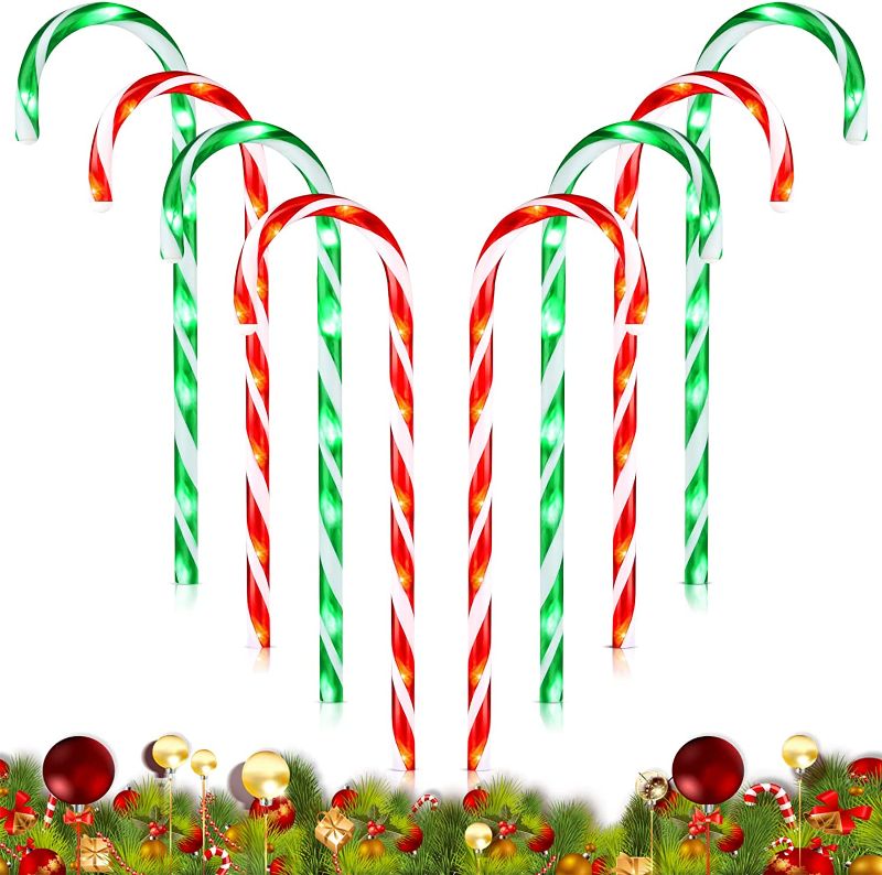 Photo 1 of 22" Christmas Candy Cane Pathway Markers Lights, Outdoor Christmas Decorations for Yard Patio Garden Walkway, Candy Cane Christmas Decor with Stake, 8 Pack, 4 Red & 4 Green