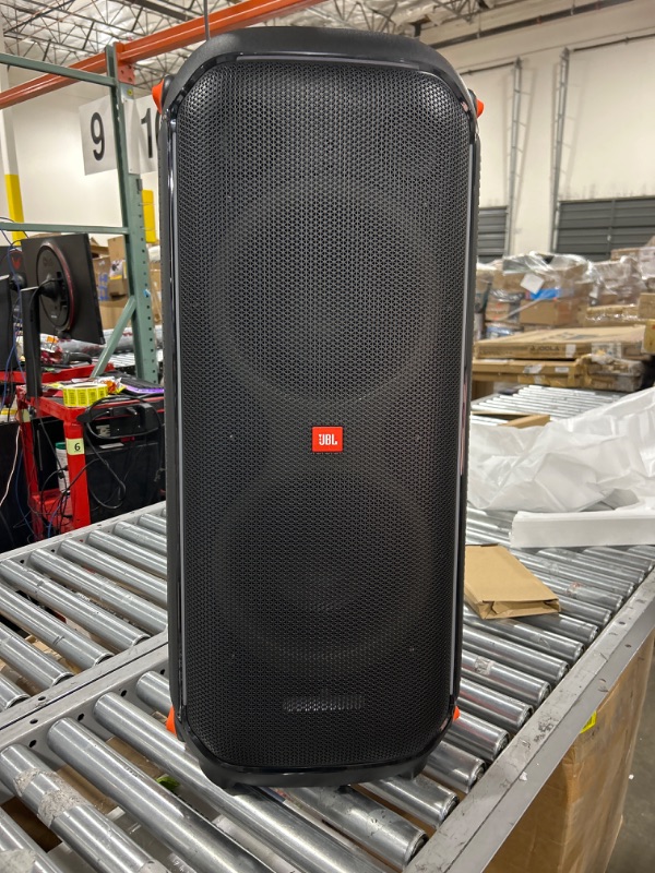 Photo 2 of JBL PartyBox 710 -Party Speaker with Powerful Sound, Built-in Lights and Extra Deep Bass, IPX4 Splash Proof, App/Bluetooth Connectivity, Made for Everywhere with a Handle and Built-in Wheels (Black)