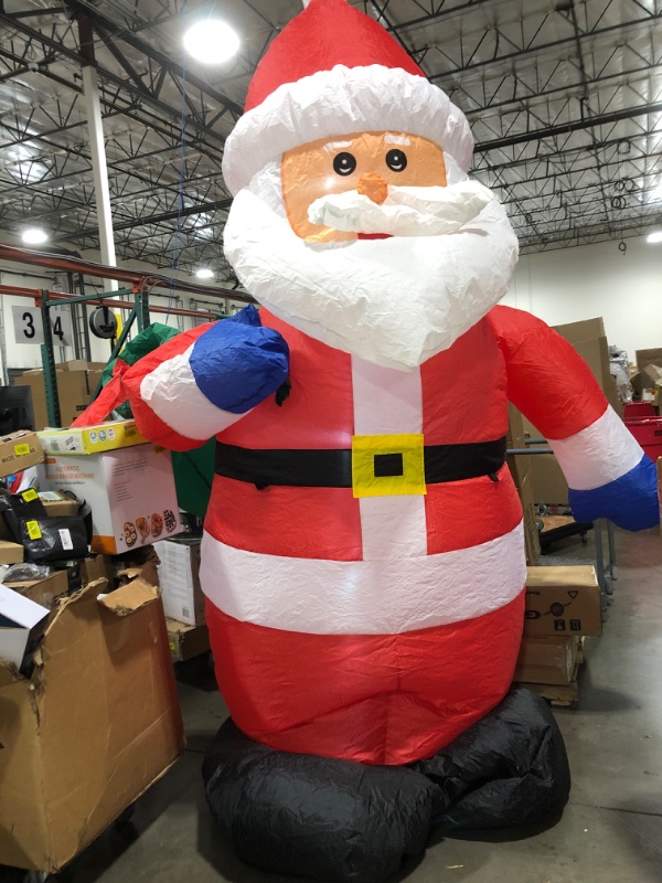 Photo 2 of 12 Feet Giant Christmas Inflatable Santa Claus Outdoor Yard Decorations, Blow up Santa Claus with Gift Bag, Huge Santa Carrying Present Sack, Outside Waterproof Xmas Decor for Party Garden Hall Plaza 12FT Inflatable Santa Claus