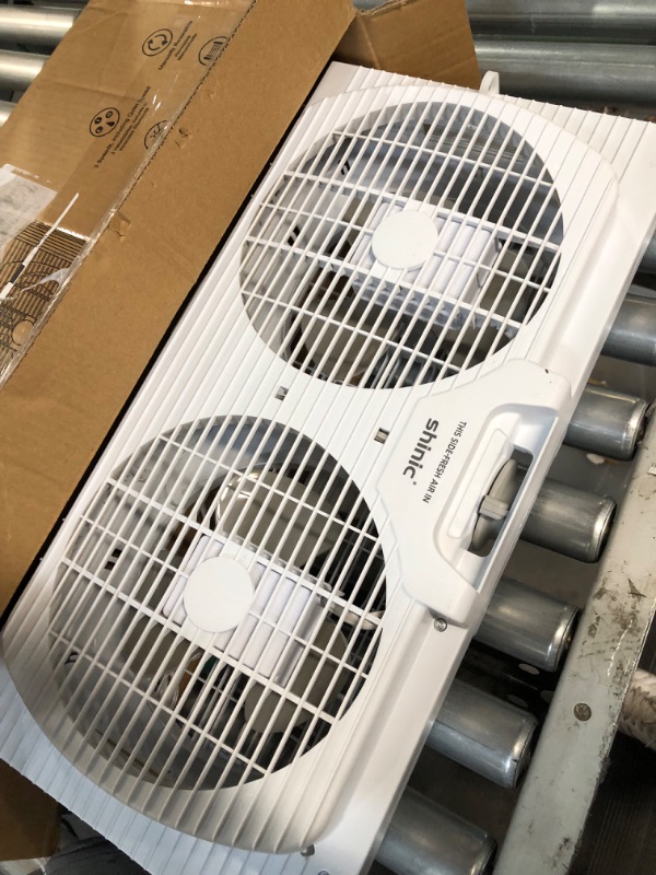 Photo 2 of *****USED**** shinic Twin Window Fan Reversible Airflow Manual Control, 3 Speed 22.5"-33"