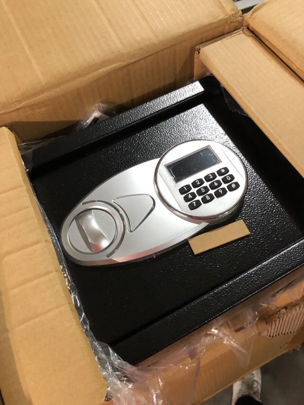 Photo 1 of * item damaged *  door is misaligned. * sold for parts or repair *
Amazon Basics Steel Security Safe and Lock Box with Electronic Keypad 13.8 x 9.8 x 9.8 Inches 