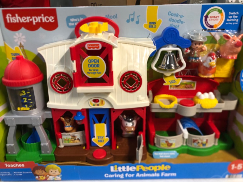 Photo 2 of Fisher-Price Little People Farm Toy, Toddler Playset with Lights Sounds and Smart Stages Learning Content, Caring for Animals Farm? Standard