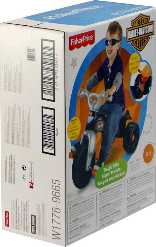 Photo 3 of Fisher-Price Harley-Davidson Tricycle with Handlebar Grips and Storage Area, Multi-Terrain Tires, Tough Trike [Amazon Exclusive]