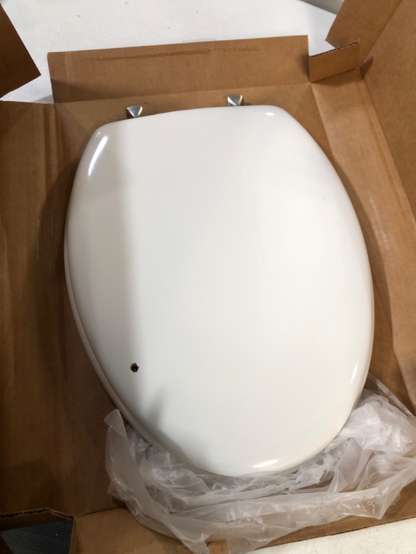 Photo 2 of Bemis 144BN Elongated Wood Toilet Seat, White