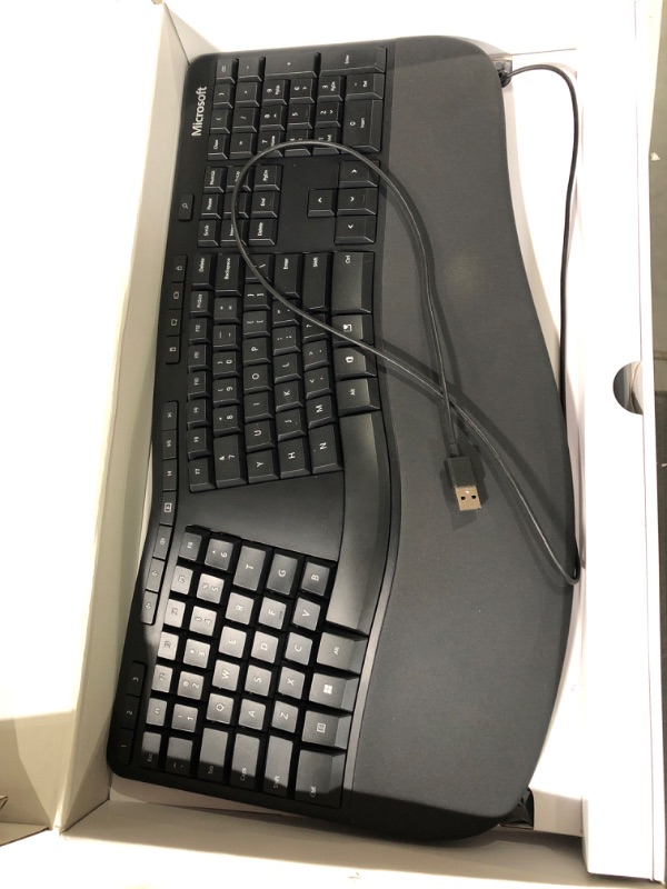 Photo 3 of Microsoft Ergonomic Keyboard - Black. Wired, Comfortable, Ergonomic Keyboard with Cushioned Wrist and Palm Support. Split Keyboard. Dedicated Office Key.