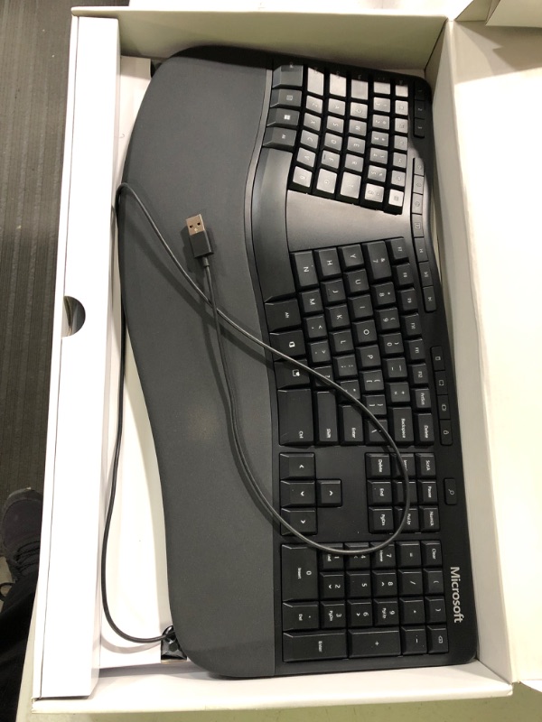 Photo 2 of Microsoft Ergonomic Keyboard - Black. Wired, Comfortable, Ergonomic Keyboard with Cushioned Wrist and Palm Support. Split Keyboard. Dedicated Office Key.