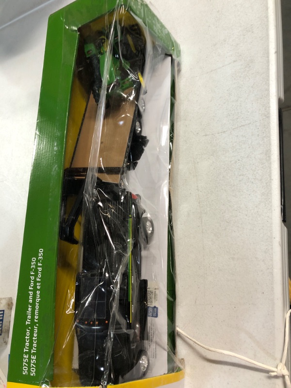 Photo 2 of ERTL 1:32 Scale Ford F350 Pickup and Tractor Set — Includes John Deere Tractor, Ford F350 Pickup and Gooseneck Trailer — 17.25 x 3.2 x 4.5 inches — Ages 3 Years and Up Tractor & Ford