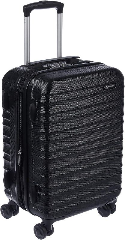 Photo 1 of Amazon Basicsardside Carry-On Spinner Suitcase Luggage - Expandable with Wheels - 21 Inch, Black