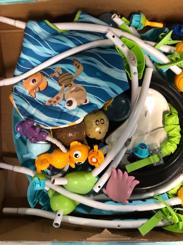 Photo 1 of Bright Starts Disney Baby Finding Nemo Sea of Activities Jumper, Ages 6 months +