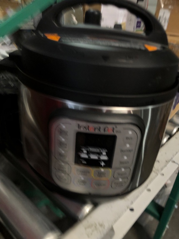 Photo 2 of **HAS A DENT ON THE SIDE** Instant Pot Duo Mini 3-Quart Multi-Use Pressure Cooker