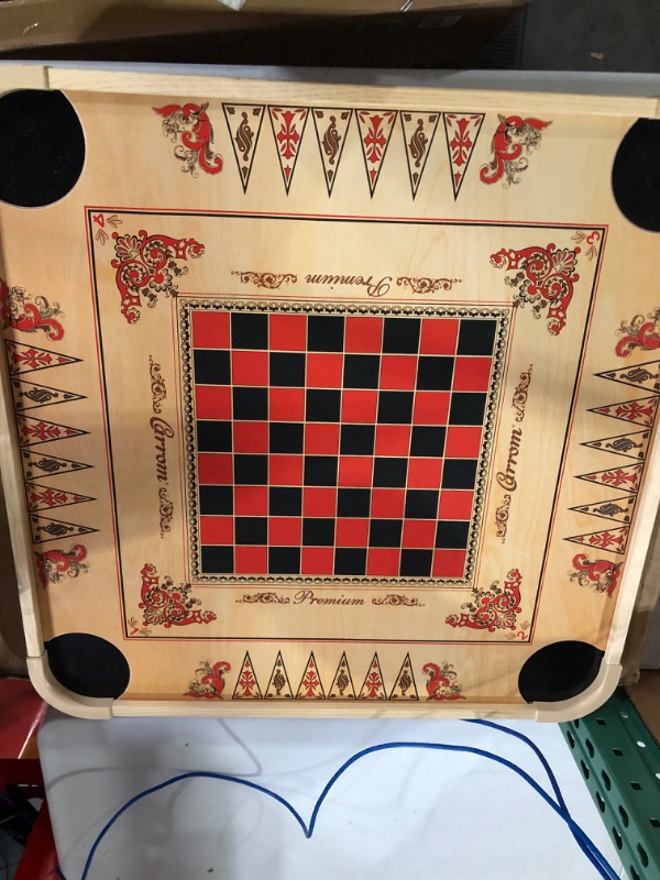 Photo 2 of -MISSING PIECES/USED-Carrom Board Game - Wooden Strike and Pocket Game Set with Group of Black and Beige Coins, 2 Red Queen Coins, Striker Coin, and Cue Sticks by Hey Play